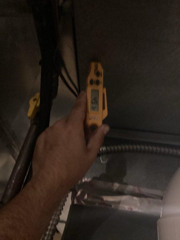 Completed routine MVP cooling maintenance visit on residential HVAC system. Performed electrical testing using voltage meter to verify proper system operation and checked outdoor disconnect box, confirming fuses and electrical connections were secure and functioning correctly. System operating within normal parameters; customer renewed MVP service agreement upon completion of inspection.