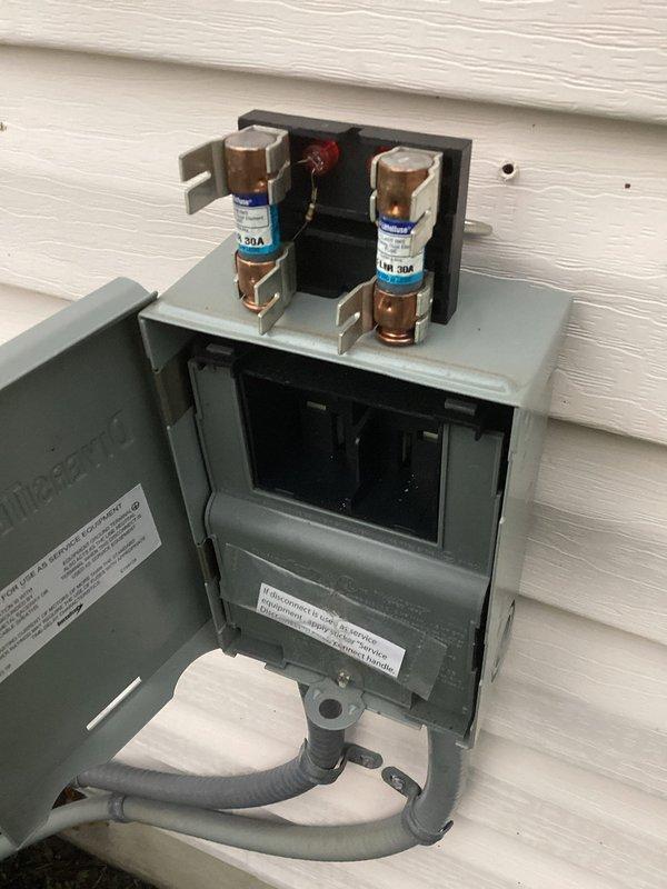 Completed routine MVP cooling maintenance visit on residential HVAC system. Performed electrical testing using voltage meter to verify proper system operation and checked outdoor disconnect box, confirming fuses and electrical connections were secure and functioning correctly. System operating within normal parameters; customer renewed MVP service agreement upon completion of inspection.