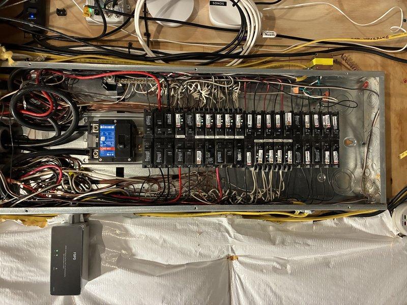 Installed dedicated 240V air conditioning circuit with new breaker in existing electrical panel. Ran appropriate gauge wiring from panel to A/C location, ensuring proper connections and wire routing throughout. Organized panel wiring, installed circuit protection, and verified all connections met code requirements for safe operation of air conditioning equipment.