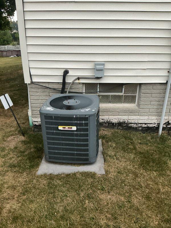 Completed full HVAC system installation including outdoor condensing unit and indoor evaporator coil. Installed new air conditioning unit on concrete pad in backyard with proper refrigerant line routing to exterior wall, mounted electrical disconnect box on siding, and established all necessary connections. Interior installation included integration of new evaporator coil with existing furnace system and complete ductwork configuration to ensure proper airflow throughout the residence.