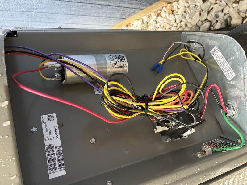 Completed scheduled BS-MVP cooling maintenance visit on 16-year-old air conditioning system. Inspected and photographed electrical control panel, capacitor, and contactor assembly. Verified proper wiring connections, tested contactor functionality showing 25A rating, and confirmed all components operating within normal parameters despite age of equipment.
