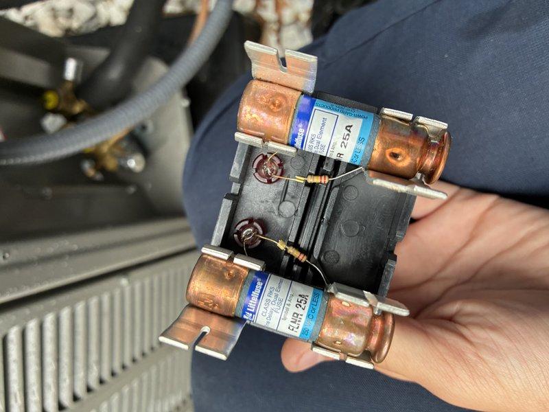 Completed scheduled BS-MVP cooling maintenance visit on 16-year-old air conditioning system. Inspected and photographed electrical control panel, capacitor, and contactor assembly. Verified proper wiring connections, tested contactor functionality showing 25A rating, and confirmed all components operating within normal parameters despite age of equipment.