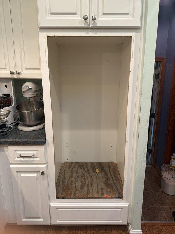 Removed double-stack oven from kitchen cabinet alcove and safely capped off all electrical wiring connections. Installed junction box to house terminated conductors in compliance with electrical code requirements, ensuring all circuits were properly de-energized and secured for future use or permanent disconnection.