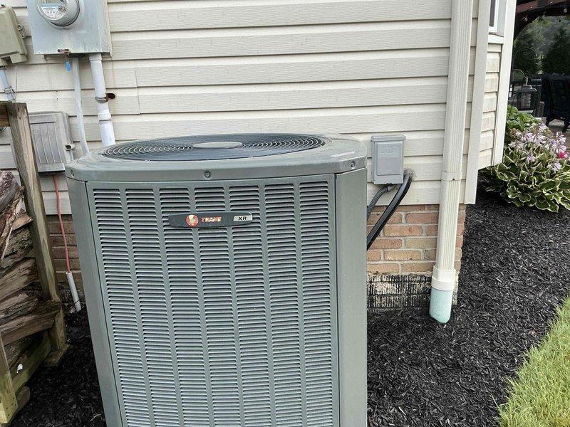 Completed HVAC estimate for replacement of 12-year-old system where a pressure switch had been bypassed. Assessed existing Trane outdoor condensing unit and indoor air handler with associated ductwork and refrigerant lines, documenting current equipment condition and installation configuration. Provided comprehensive replacement proposal for new furnace and air conditioning system to restore proper safety controls and system functionality.