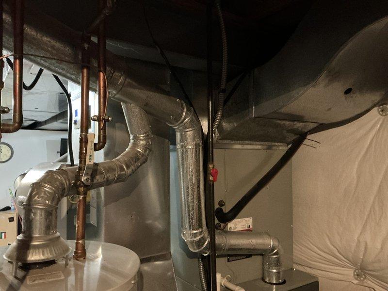 Completed HVAC estimate for replacement of 12-year-old system where a pressure switch had been bypassed. Assessed existing Trane outdoor condensing unit and indoor air handler with associated ductwork and refrigerant lines, documenting current equipment condition and installation configuration. Provided comprehensive replacement proposal for new furnace and air conditioning system to restore proper safety controls and system functionality.