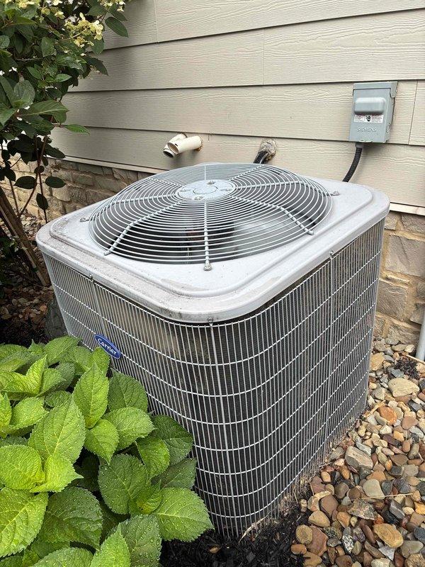 Completed MVP cooling maintenance visit on residential air conditioning system. Performed electrical diagnostics at control panel, measuring 24V control voltage with digital multimeter to verify proper system operation. Inspected outdoor condenser unit, including fan assembly, condenser coils, and electrical disconnect. All components operating within normal parameters and system performing as expected.