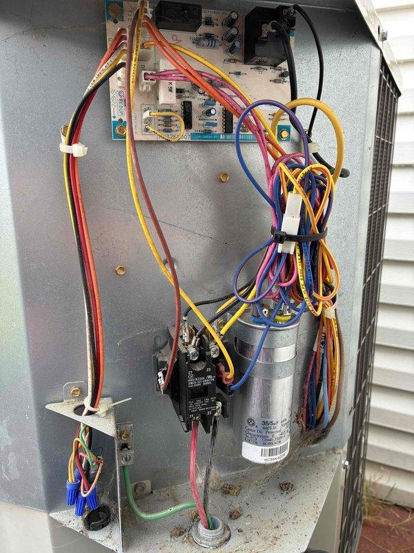 Completed MVP recurring cooling maintenance visit on residential outdoor condensing unit. Performed comprehensive system inspection including electrical control panel, capacitor, contactors, and wiring connections; verified proper operation of all components and documented unit condition with photos showing organized wire routing and functional electrical systems.