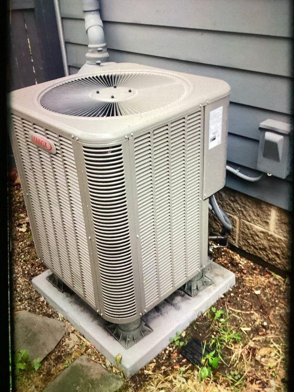 # HVAC Maintenance - Cooling Service

Completed MVP cooling maintenance visit on a 2-year-old Lennox heat pump system. Upon inspection of the indoor air handler, discovered extensive ice and frost buildup throughout the evaporator coil assembly, with crystalline frost completely covering the serpentine coil tubes and surrounding components. The frost accumulation was particularly dense on horizontal refrigerant lines and coiled sections, indicating a significant operational issue requiring immediate attention.

Investigated the root cause of the icing condition, which typically results from restricted airflow, low refrigerant charge, or system control malfunction. Allowed the system to thaw completely before proceeding with diagnostic testing. Inspected air filter condition, verified proper airflow across the evaporator coil, and checked all electrical connections and control wiring within the air handler cabinet. Examined the brass fittings and refrigerant line connections for signs o
