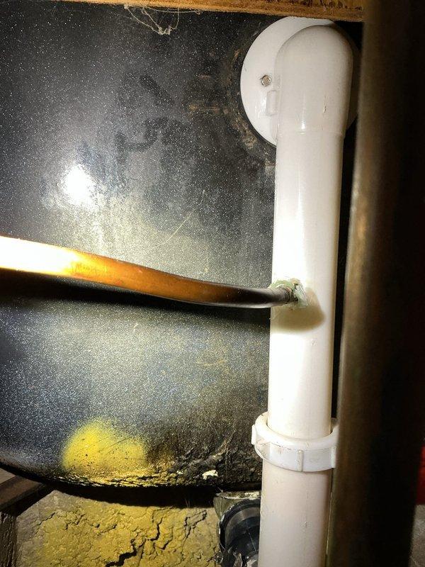 Responded to main line backup issue in yard caused by tree root intrusion and debris accumulation. Cleared ground water drain and main sewer line using appropriate rooter equipment to restore proper flow and drainage. Inspected accessible plumbing connections and P-trap assembly under sink, verifying system integrity and proper drainage throughout. All blockages removed successfully, and water flow restored to normal operation.