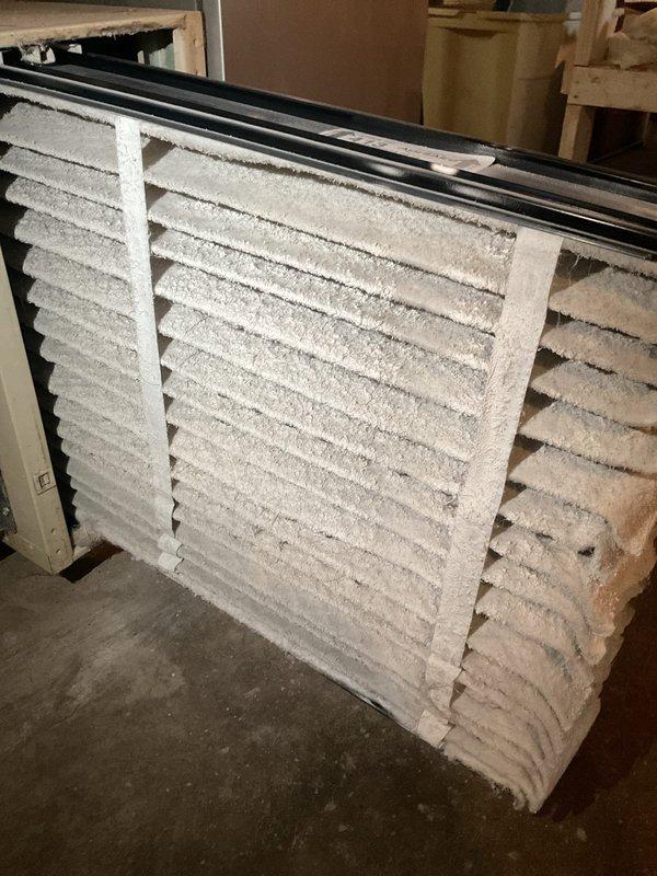 Completed MVP cooling maintenance visit on 9-year-old residential HVAC system. Upon inspection, discovered severely clogged return air filter with excessive dust and debris accumulation, restricting airflow to the system. Replaced dirty filter to restore proper air circulation and system efficiency. Performed standard cooling season maintenance checks on furnace and ductwork components, verified condensate drain line operation, and inspected all accessible system connections and hardware for proper function.