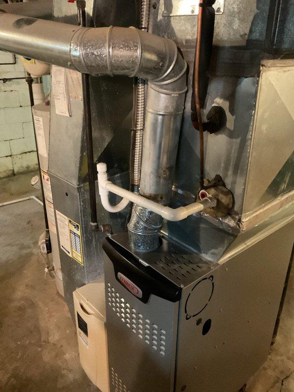 Completed MVP cooling maintenance visit on 9-year-old residential HVAC system. Upon inspection, discovered severely clogged return air filter with excessive dust and debris accumulation, restricting airflow to the system. Replaced dirty filter to restore proper air circulation and system efficiency. Performed standard cooling season maintenance checks on furnace and ductwork components, verified condensate drain line operation, and inspected all accessible system connections and hardware for proper function.
