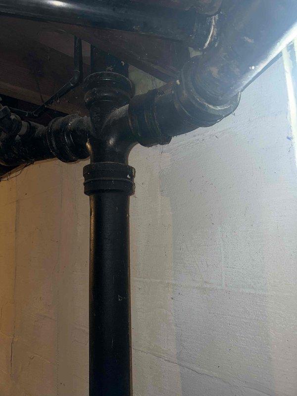 Responded to a service call for a toilet leak around the base seal that had created a water hazard on the floor. Inspected the toilet flange connection and wax ring seal, which showed signs of failure allowing water to escape during flushing. Removed and reset the toilet with a new wax ring seal to eliminate the leak and restore proper watertight connection to the drain system.