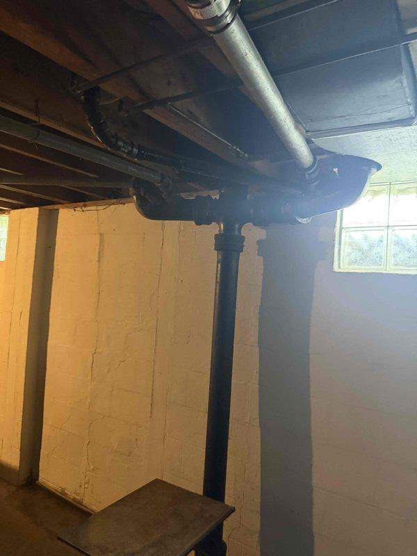 Responded to a service call for a toilet leak around the base seal that had created a water hazard on the floor. Inspected the toilet flange connection and wax ring seal, which showed signs of failure allowing water to escape during flushing. Removed and reset the toilet with a new wax ring seal to eliminate the leak and restore proper watertight connection to the drain system.