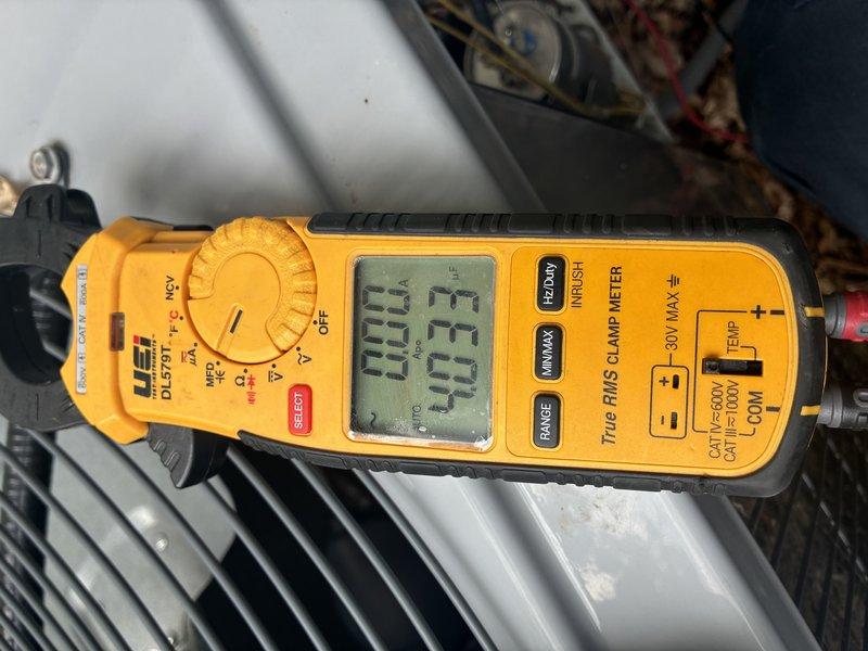 Completed routine MVP cooling maintenance visit on HVAC system. Performed electrical diagnostics using clamp meter, measuring current draw at 4.39 amperes on system components to verify proper compressor and blower motor operation within manufacturer specifications.