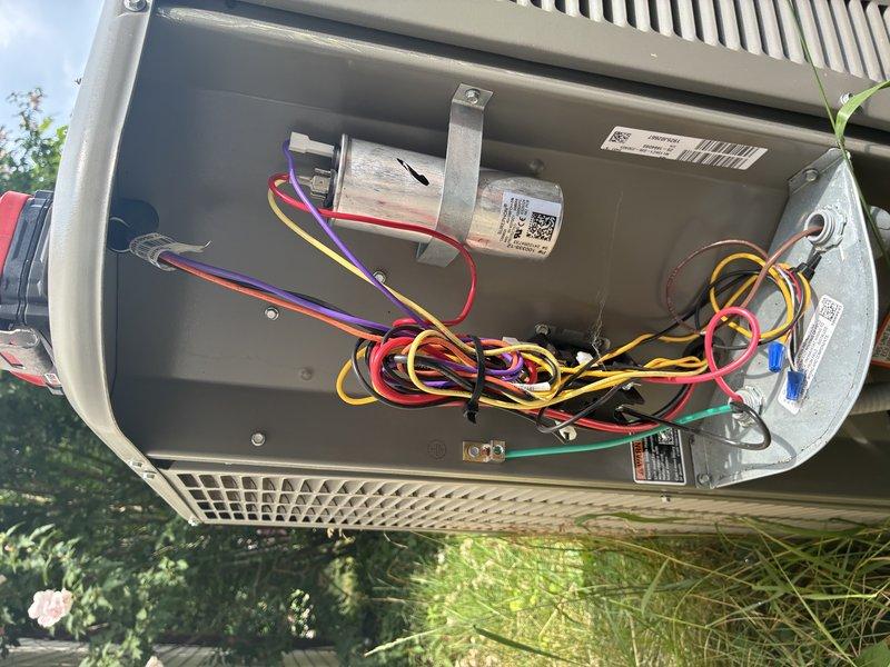 Completed preventive maintenance inspection on outdoor AC unit for MVP customer. Removed access panel and inspected electrical components including capacitor, wiring connections, and blower motor assembly. Verified proper operation of blower wheel and documented system condition with photos showing clean interior components and properly functioning equipment.