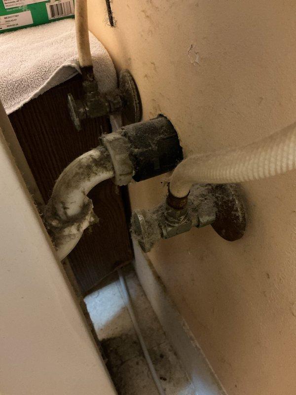 # Plumbing Service Report

Responded to service call at group home facility for two clogged bathroom sinks. Upon inspection, found white porcelain Jacuzzi bathroom sinks with chrome two-handle faucets experiencing drainage issues. Cleared obstructions from both sink drain lines using appropriate drain cleaning equipment and techniques. Inspected accessible plumbing connections beneath sinks, noting existing corrosion and mineral deposits on visible piping, though these pre-existing conditions did not impact the immediate drainage repair. Tested water flow and drainage in both bathroom sinks after clearing blockages, confirming proper function and adequate drainage speed. Both sinks now draining properly with no standing water or slow drainage issues remaining.