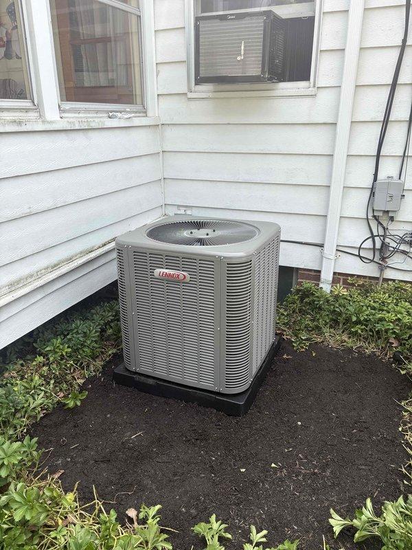 Completed second-phase installation of residential split-system air conditioning unit with matching evaporator coil. Installed Lennox outdoor condensing unit on vibration-dampening pad with proper clearances, connected refrigerant lines to indoor evaporator coil mounted above existing Trane furnace, established electrical connections to exterior disconnect and meter, and verified system operation with proper refrigerant charge and airflow.