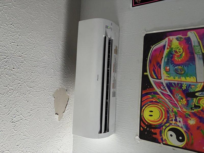 Installed dedicated electrical circuit for wall-mounted air conditioning unit, running new wiring from main electrical panel through interior walls to AC location. Completed all connections, verified proper voltage and amperage, and confirmed unit operational with adequate power supply.