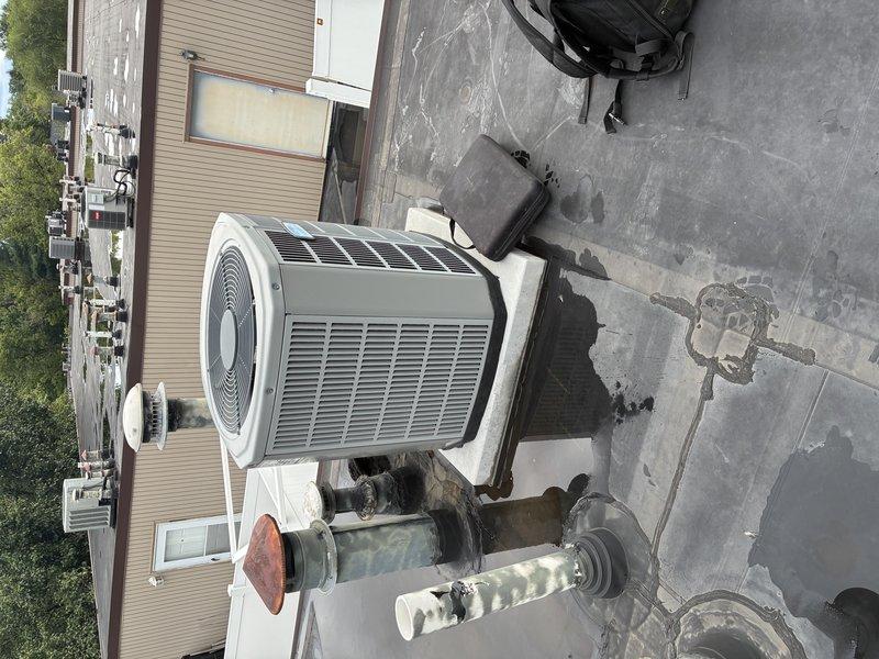 Completed comprehensive AC tune-up on rooftop unit. Performed visual inspection of condenser unit exterior, verified proper operation of fan motor and compressor, checked refrigerant lines and connections for leaks, and inspected electrical components and control board inside air handler. All systems operating within normal parameters with no issues identified.