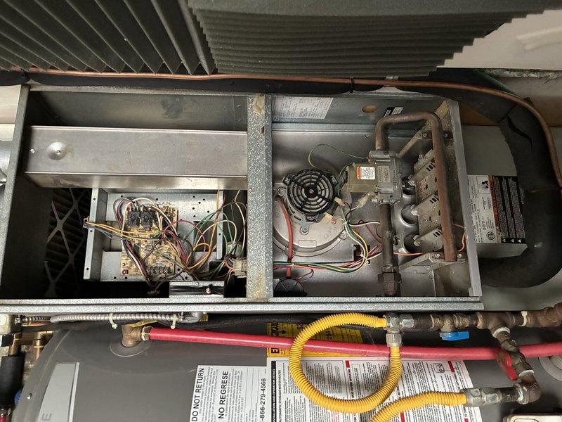 Completed comprehensive AC tune-up on rooftop unit. Performed visual inspection of condenser unit exterior, verified proper operation of fan motor and compressor, checked refrigerant lines and connections for leaks, and inspected electrical components and control board inside air handler. All systems operating within normal parameters with no issues identified.