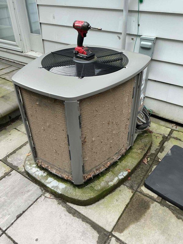 Completed routine preventive maintenance on a 5-year-old residential air conditioning system. Performed standard cooling season inspection including cleaning condenser coils, checking refrigerant levels, testing electrical connections, and verifying proper system operation. Unit showed minor corrosion at base due to moisture exposure but is functioning within normal parameters.