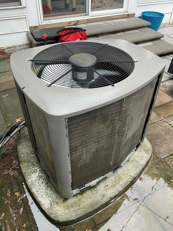 Completed routine preventive maintenance on a 5-year-old residential air conditioning system. Performed standard cooling season inspection including cleaning condenser coils, checking refrigerant levels, testing electrical connections, and verifying proper system operation. Unit showed minor corrosion at base due to moisture exposure but is functioning within normal parameters.