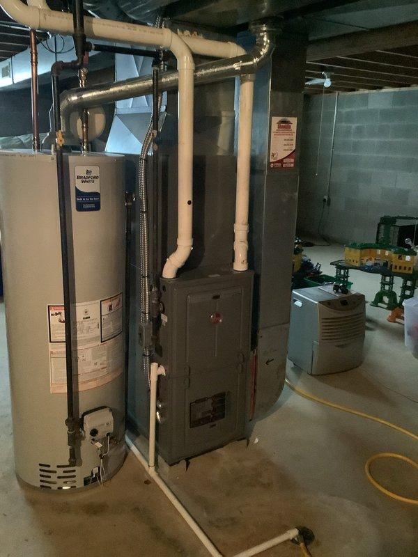 Performed comprehensive AC tune-up on 4-year-old residential cooling system. Inspected outdoor condensing unit, indoor air handler, and all associated components; verified proper operation of all mechanical and electrical systems. System operating within manufacturer specifications; no issues identified during maintenance visit.