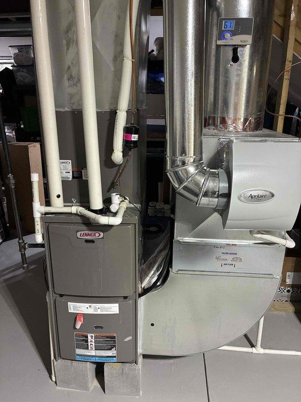 Completed BS-MVP cooling maintenance visit on 8-year-old system. Performed comprehensive inspection of Lennox furnace and connected HVAC components, verified proper operation of Aprilaire humidifier integration, and assessed ductwork connections. Measured and documented ambient temperature reading of 78.0°F in attic space to verify system performance and airflow efficiency.