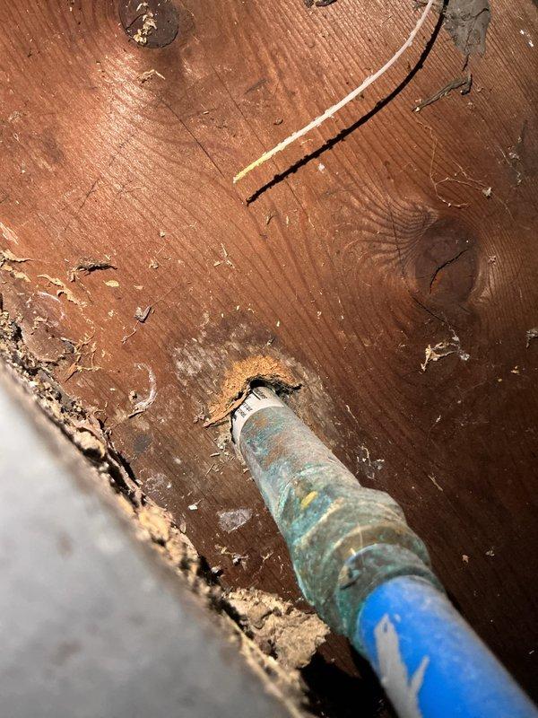 Responded to service call for leaking exterior hose bib. Upon inspection, found corroded brass valve body with compromised seal causing active water leakage at the foundation level. Replaced deteriorated hose bib assembly with new frost-free sillcock, ensuring proper pitch for drainage and secure mounting to exterior wall framing through vinyl siding. Tested valve operation and verified complete seal with no residual leakage upon completion.