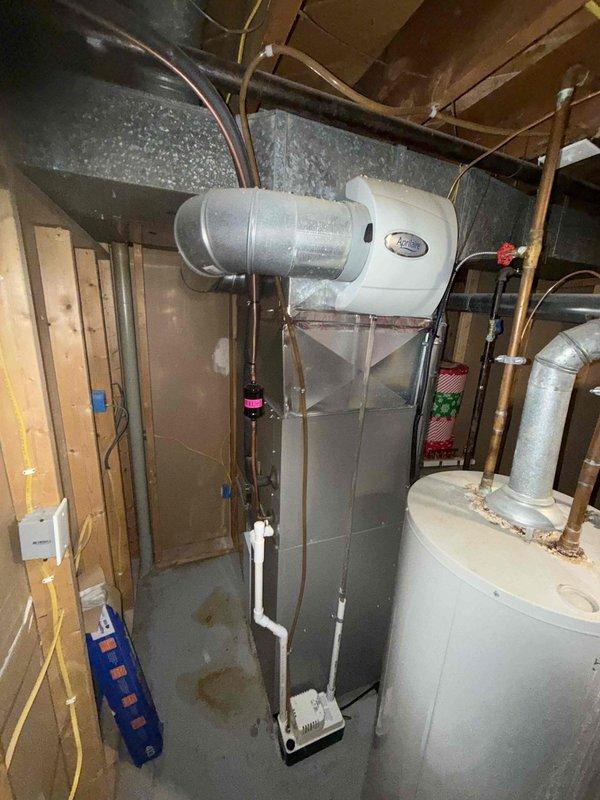 Completed annual air conditioning maintenance on Lennox condenser unit and associated indoor air handler system. Performed comprehensive system inspection including electrical connections, refrigerant levels, and airflow verification. Cleaned condenser coils and checked fan operation on outdoor unit. Inspected indoor air handler, ductwork connections, and condensate drainage system. All components found operating within normal parameters. Unit tested and confirmed cooling properly at completion of service.