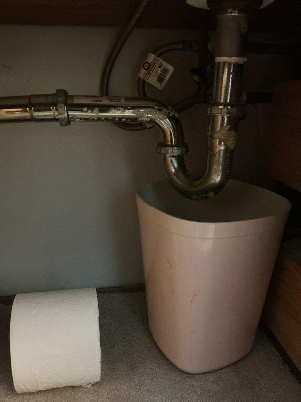 Conducted service call assessment and provided quotes for multiple plumbing issues. Inspected downstairs bathroom sink with leaking P-trap beneath basin and malfunctioning pop-up drain assembly that requires repair. Additionally identified clogged toilet requiring clearing service.