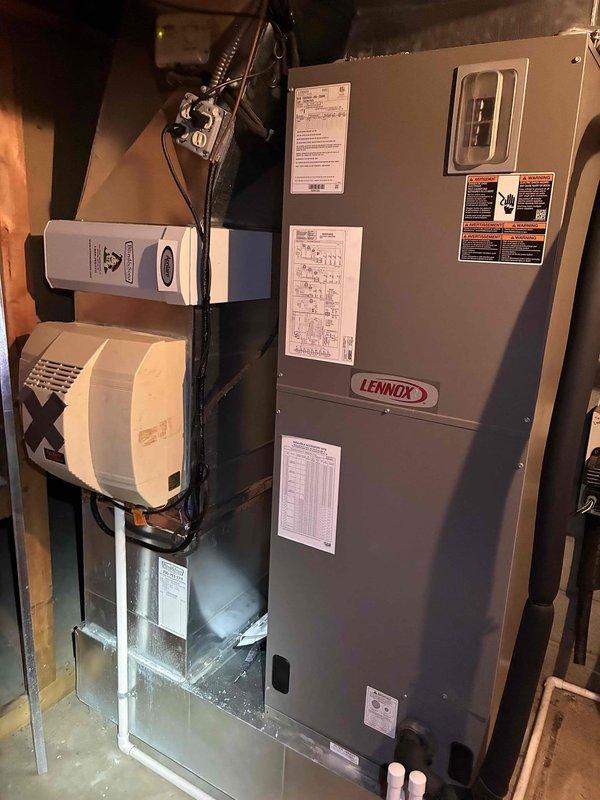 Completed preventative maintenance cooling visit on Lennox split system (2-4 years old). Inspected indoor air handler unit in basement and outdoor condensing unit, verified all components operating within normal parameters. System found in good working condition with no issues identified; all labels, wiring, and connections properly secured and functioning as designed.