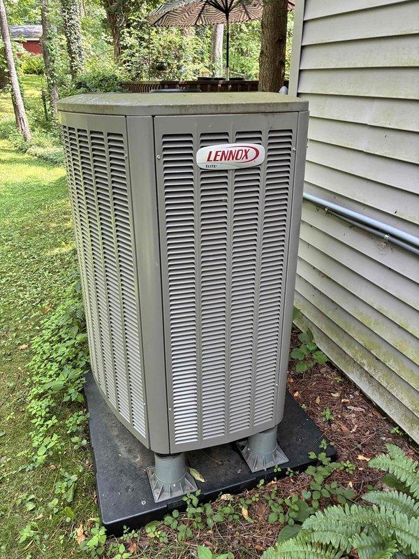 Completed preventative maintenance cooling visit on Lennox split system (2-4 years old). Inspected indoor air handler unit in basement and outdoor condensing unit, verified all components operating within normal parameters. System found in good working condition with no issues identified; all labels, wiring, and connections properly secured and functioning as designed.