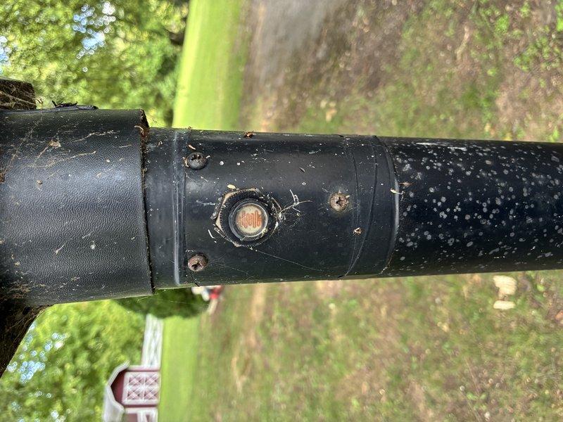 Responded to service call for non-functioning garage lighting and driveway lamp post. Inspected two fluorescent fixtures in garage where one unit was completely inoperative and the second exhibited intermittent flashing. Identified faulty ballast in non-working fixture and loose wiring connections in the intermittent unit. Replaced defective ballast and secured all electrical connections at junction box. Tested both fixtures to confirm proper operation. Examined lamp post at end of driveway and found weathered exterior housing with corroded mounting hardware and potential wiring issues requiring further assessment. All garage lighting restored to full functionality.