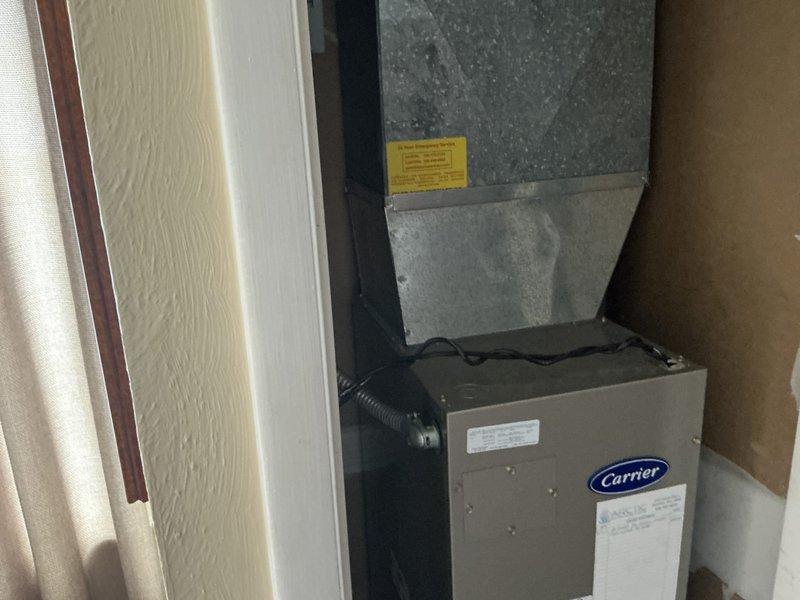 Provided estimate for complete heat pump system replacement on 10-year-old unit with confirmed refrigerant leak. Evaluated existing Carrier indoor air handler and outdoor heat pump unit, documented current installation configuration including ductwork connections and electrical service, and presented replacement options to customer.
