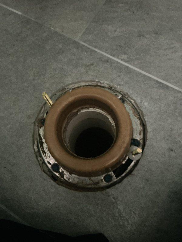Removed and reset toilet with new wax ring and closet bolts. Upon inspection, the existing toilet flange showed signs of deterioration and corrosion with compromised seal integrity. Installed fresh wax ring to ensure proper watertight seal between toilet base and drain connection. Replaced corroded closet bolts with new hardware and secured toilet firmly to floor. System tested and confirmed leak-free operation upon completion.