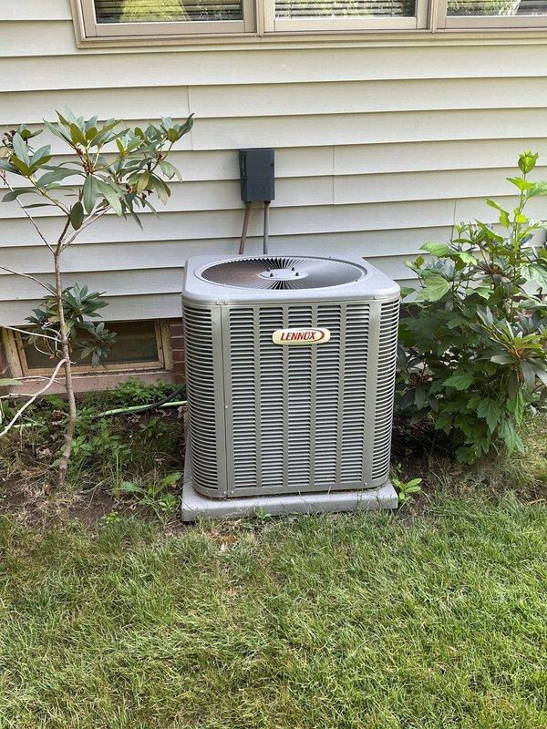Completed comprehensive tune-up on 10-year-old Lennox air conditioning system, including outdoor condenser unit and indoor furnace. Performed standard maintenance procedures: inspected electrical connections and disconnect box, cleaned condenser coils, checked refrigerant levels, tested capacitor and contactor operation, verified proper airflow through ventilation fins, examined condensate drain lines and PVC venting system, inspected ductwork connections, and confirmed all safety controls were functioning correctly. System operating within manufacturer specifications with no deficiencies noted at time of service.