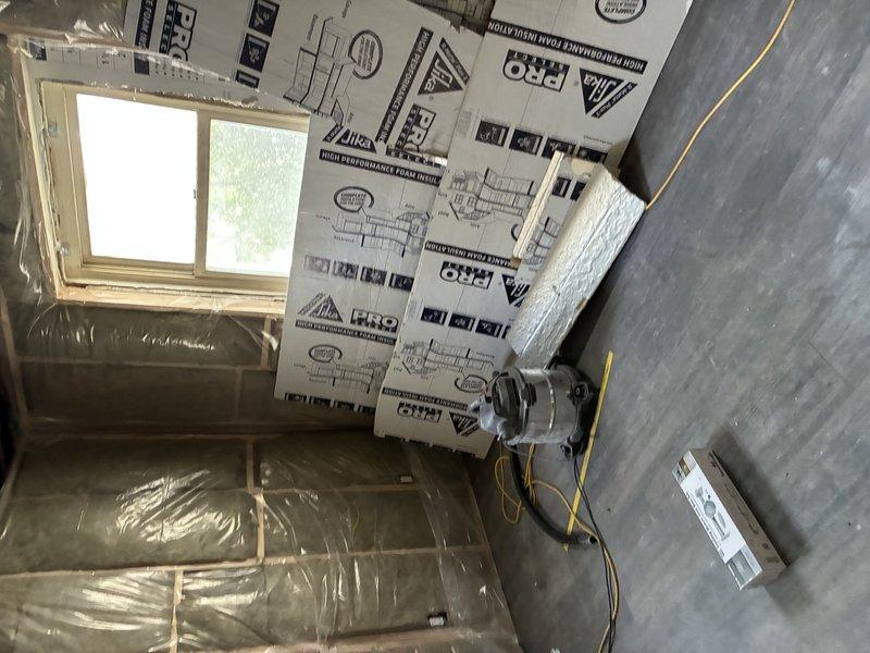 Completed full electrical renovation for residential property with exposed walls following customer demo. Removed all existing outdated wiring from crawl space and living areas, then installed new electrical runs throughout the structure according to current code requirements. Installed proper junction boxes, ran new wire through wall cavities and insulated areas, and prepared circuits for fixture installation in renovated spaces.