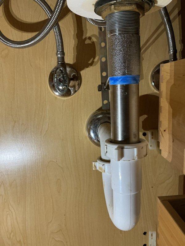 Replaced defective 4-inch center-set two-handle lavatory faucet due to robust leaking on cold side and minor dripping on hot side. Installed new chrome faucet assembly with cross-handle controls and new braided stainless steel supply lines connected to existing shut-off valves. Tested both hot and cold water supply for proper flow and verified all connections leak-free upon restoration of water service.