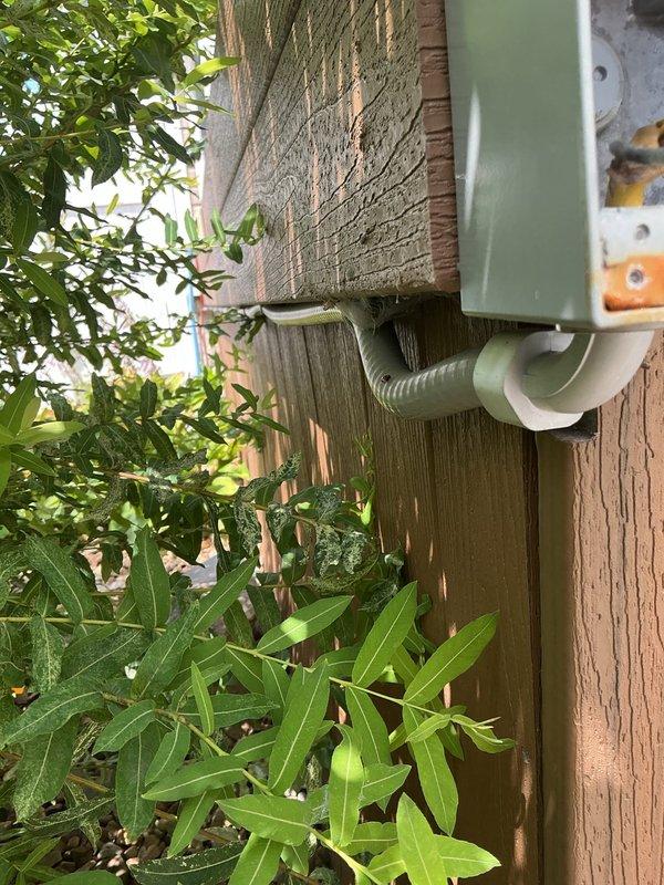 Responded to service call for circuit breaker tripping issue. Performed diagnostic inspection of exterior electrical system including meter box, disconnect box, and associated conduit and wiring. Inspected electrical connections and conduit runs on building exterior to identify potential fault causing breaker trips. Documented existing electrical infrastructure and component conditions for troubleshooting purposes.