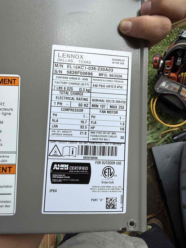 # HVAC Install - Complete System

Completed installation of a 90% efficiency furnace and air conditioning system. Installed a Lennox 3-ton air conditioning unit (Model E16KC1-036-230A03) with R-454B refrigerant, manufactured June 2026, rated for 208/230V single-phase operation. Unit specifications include compressor RLA of 16.7 amps and total refrigerant charge of 7 lbs 6 oz. Verified proper electrical connections and installed 30-amp Littelfuse fuses in disconnect housing for overcurrent protection. Connected refrigerant lines with appropriate service ports and secured all electrical wiring per manufacturer specifications and local code requirements. System tested and operational, meeting AHRI certification standards with IPX4 weather resistance rating.