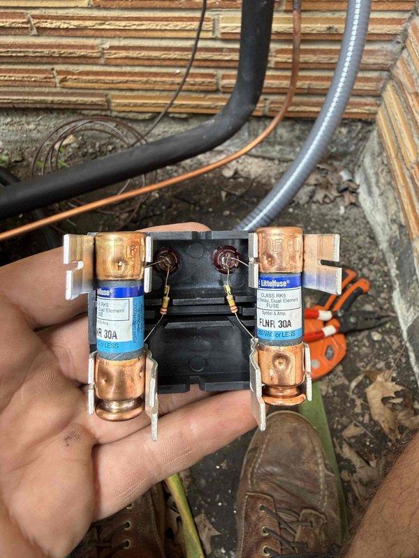 # HVAC Install - Complete System

Completed installation of a 90% efficiency furnace and air conditioning system. Installed a Lennox 3-ton air conditioning unit (Model E16KC1-036-230A03) with R-454B refrigerant, manufactured June 2026, rated for 208/230V single-phase operation. Unit specifications include compressor RLA of 16.7 amps and total refrigerant charge of 7 lbs 6 oz. Verified proper electrical connections and installed 30-amp Littelfuse fuses in disconnect housing for overcurrent protection. Connected refrigerant lines with appropriate service ports and secured all electrical wiring per manufacturer specifications and local code requirements. System tested and operational, meeting AHRI certification standards with IPX4 weather resistance rating.