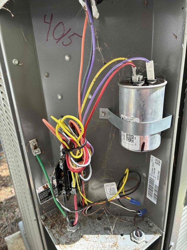 Completed routine maintenance tune-up on 3-year-old HVAC system, unit #405. Inspected electrical control panel, verified capacitor operation and all wire connections secure, and confirmed proper refrigerant temperatures at 73°F with normal condensation present on evaporator coil. All components operating within manufacturer specifications.