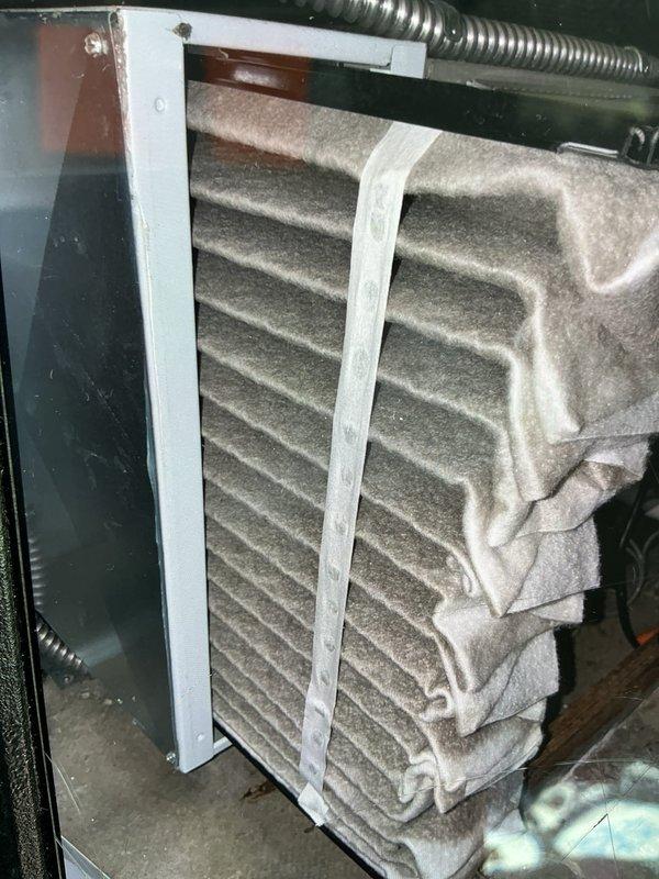 Responded to customer complaint of AC blowing hot air during rain events. Upon inspection, discovered evaporator coil heavily obstructed with dust and debris accumulation, severely restricting airflow through the system. Cleaned evaporator coil assembly and replaced clogged air filter. Verified proper drainage through condensate lines and inspected PVC drain piping for blockages that could cause moisture-related issues during rainfall. System restored to proper cooling operation with adequate airflow.