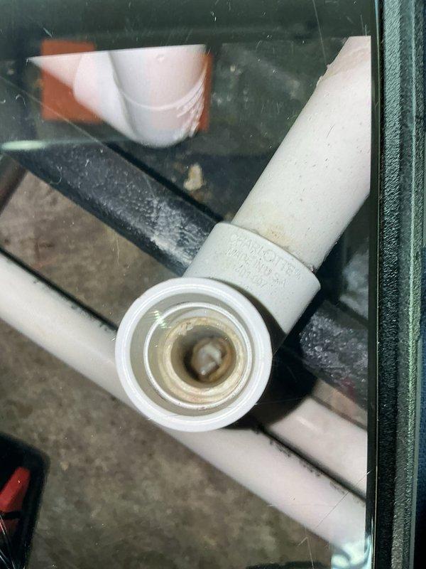 Responded to customer complaint of AC blowing hot air during rain events. Upon inspection, discovered evaporator coil heavily obstructed with dust and debris accumulation, severely restricting airflow through the system. Cleaned evaporator coil assembly and replaced clogged air filter. Verified proper drainage through condensate lines and inspected PVC drain piping for blockages that could cause moisture-related issues during rainfall. System restored to proper cooling operation with adequate airflow.