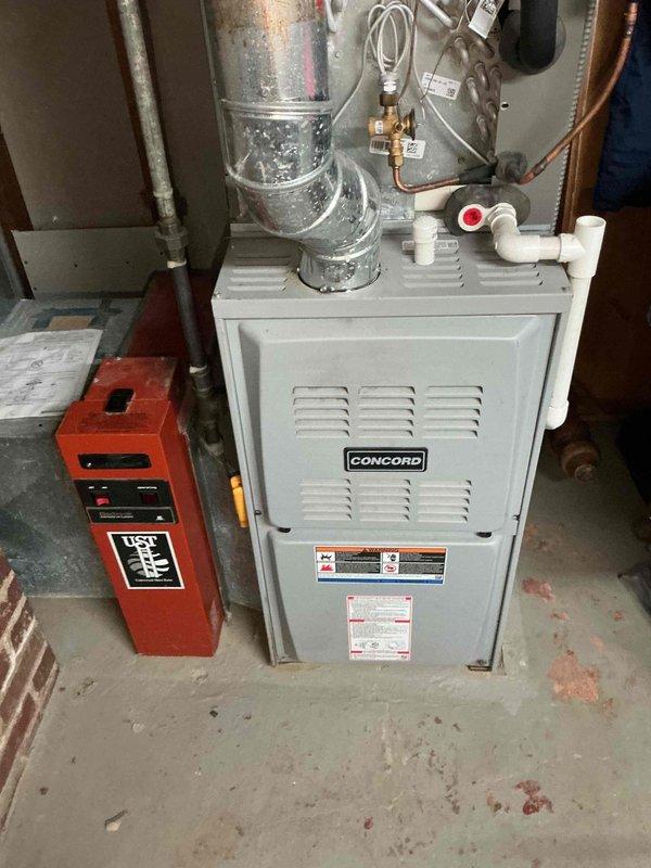 Completed cooling maintenance on Concord furnace system with integrated air handler. Performed comprehensive tune-up inspection of HVAC equipment, including examination of ductwork, refrigerant lines, condensate drainage system, and electrical connections. System confirmed operational with all components functioning properly at time of service.