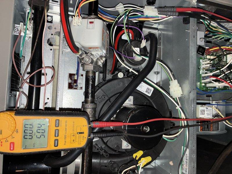 Completed scheduled MVP heating maintenance visit on 2-year-old system. Performed comprehensive system diagnostics including electrical testing with multimeter to verify proper voltage and amperage across control board circuits and safety components. Inspected ventilation grilles and louvers for proper airflow, confirmed all slats were properly aligned and unobstructed. Examined control panel wiring harness, verified all wire connections were secure with no signs of overheating or degradation. Tested blower motor assembly operation and checked relay functionality. All components operating within manufacturer specifications, system ready for heating season.