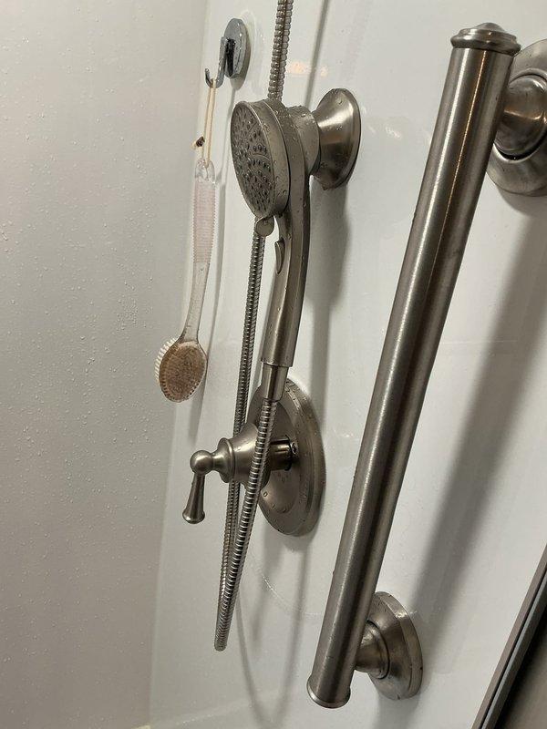 Completed follow-up service call to repair leaking washing machine water supply line. Replaced faulty shut-off valve and supply connection, tested both hot and cold water lines for proper operation and confirmed leak was fully resolved with no further dripping or moisture present.