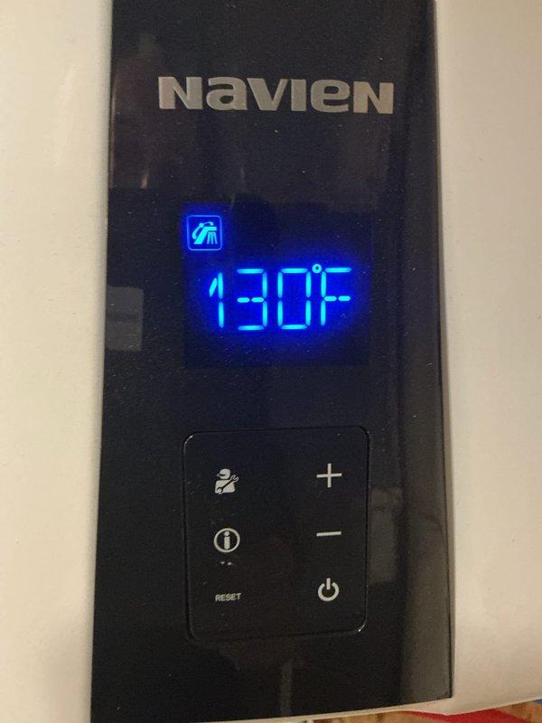 Replaced recirculation pump and flow sensor on Navien tankless water heater per manufacturer specifications. Verified proper operation of digital control panel displaying 130°F, tested all plumbing connections including PEX and copper supply lines, and confirmed system functionality with no leaks detected.