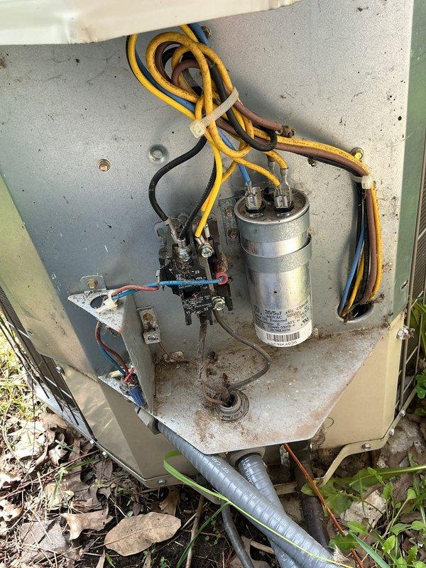 Responded to no cooling complaint on 7-year-old Payne PA13NA024-B air conditioning system. Found outdoor unit running with condenser fan operational but system not producing cold air throughout residence. Performed diagnostic evaluation of electrical components including contactor and dual capacitor. Inspected refrigerant circuit and determined system had lost refrigerant charge. Identified leak, performed repairs, evacuated system, and recharged with proper amount of R-410A refrigerant to manufacturer specifications. Verified proper amperage draw, temperature split, and system operation upon completion with unit cooling effectively.